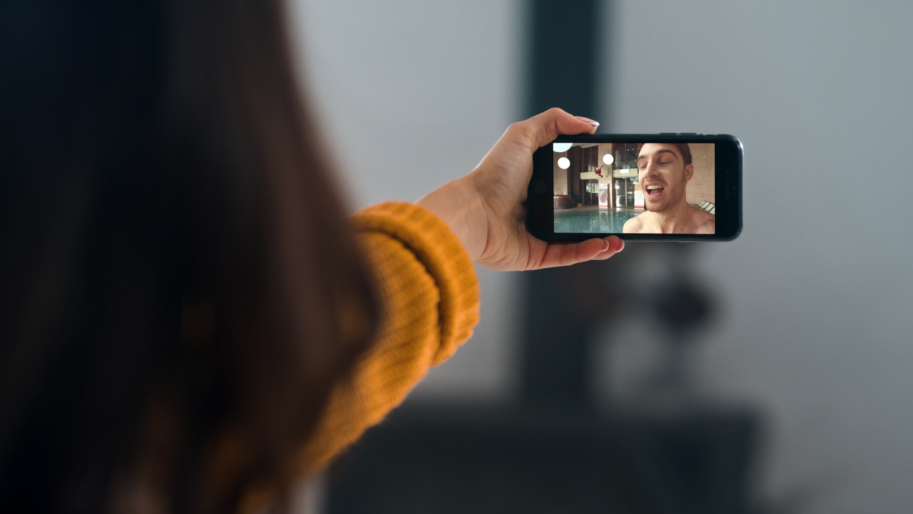 woman talking smartphone videocall with boyfriend 2024 03 19 18 44 39 utc 1.jpg